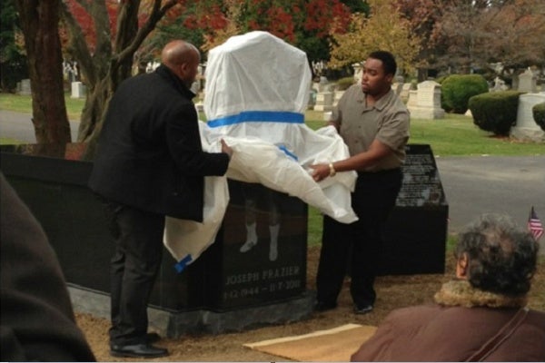 <p><p>A tomb in which the remains of late boxing legend Smokin' Joe Frazier will rest was unveiled at Ivy Hill Cemetery in Cedarbrook on Saturday. Pictured: Frazier's sons River and Derek. (Photo courtesy of Derek Frazier)</p></p>
