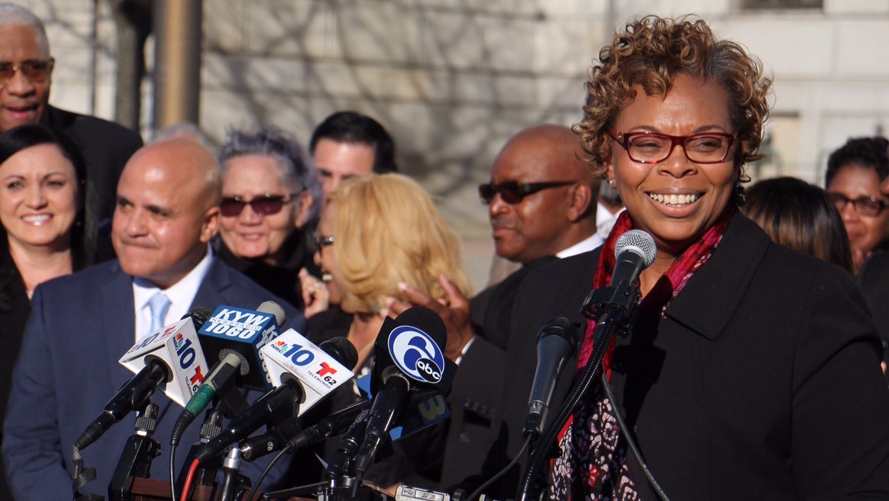  Camden Mayor Dana Redd (right) announces she will not seek a third term and endorses Council President Frank Moran (left) to replace her. (Emma Lee/WHYY) 