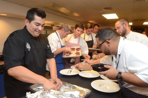 <p><p>Chef Jose Garces plates up the VIP dinner with top Philadelphia chefs Michael Solomonov, Jeff Michaud, Jonathan "Mac" Adams, Pierre Camels, Tim Spinner and Kevin Sbraga. (Photo courtesy of HughE Dillon)</p></p>
