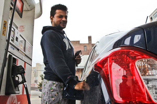 <p>Ronak Vora feels the pain at the pump but said that he doesn't drive much. (Kimberly Paynter/WHYY)</p>
