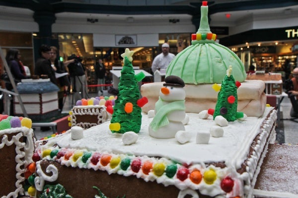 <p>James Rodenbaugh of Br?l?e Catering created this gingerbread replica of the Please Touch Museum including the building's iron and glass dome. (Kimberly Paynter/for NewsWorks)</p>
