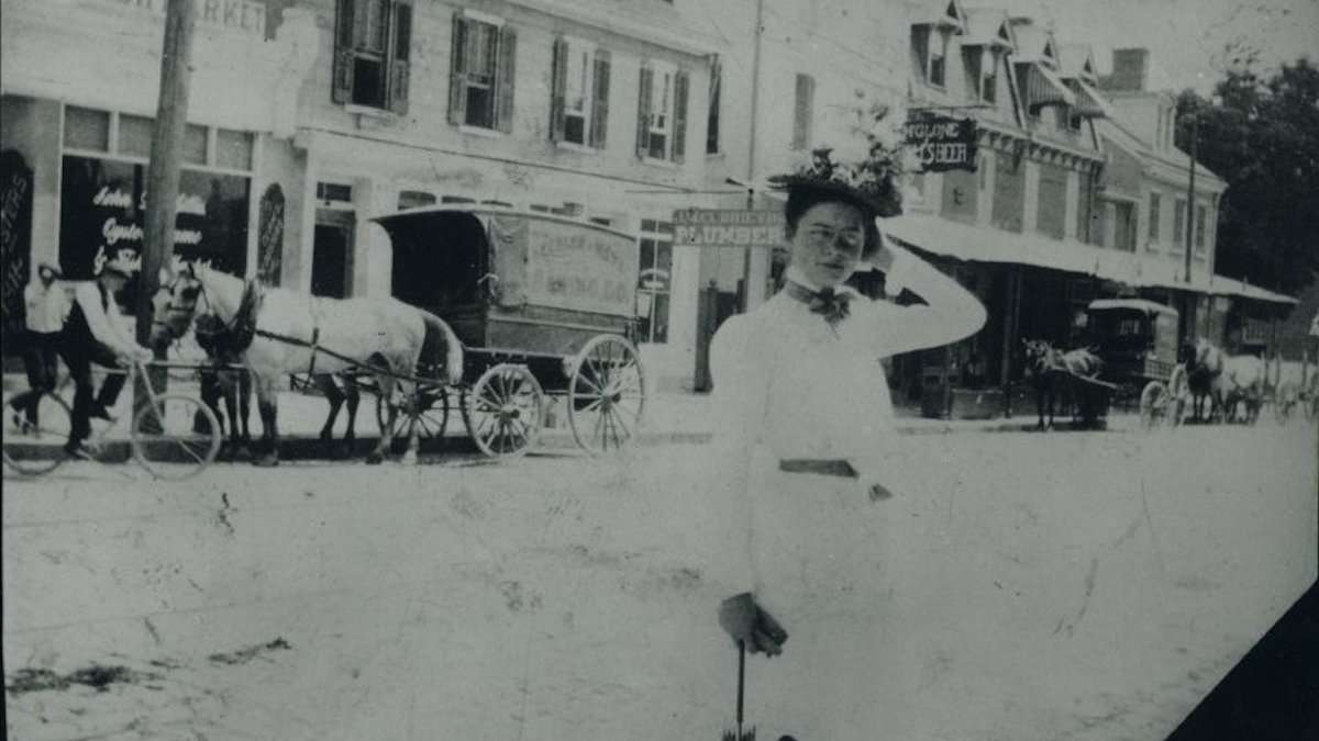 Print of an unknown lady. The background is the block of East Evergreen Avenue and Germantown Avenue. (Courtesy of Chestnut Hill Historical Society)