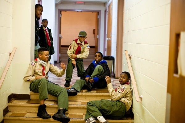 <p><p>Members of Boy Scout Troop 358 sit in a hallway of Grace Baptist Church in Germantown before the start of their meeting. (Brad Larrison/for NewsWorks)</p></p>
