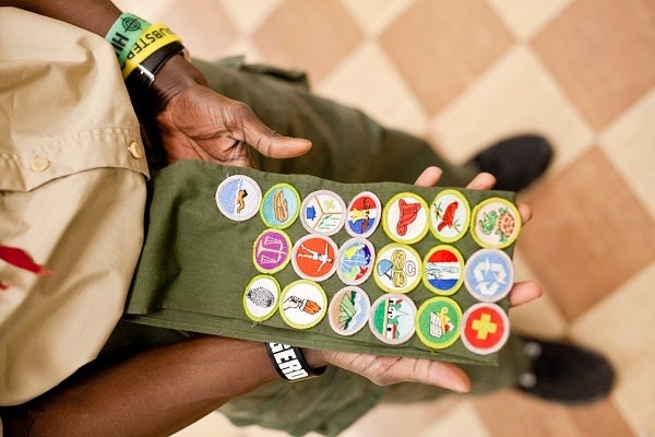 <p><p>Armond Smith of Boy Scout Troop 358 shows off his collection of merit badges. (Brad Larrison/for NewsWorks)</p></p>
