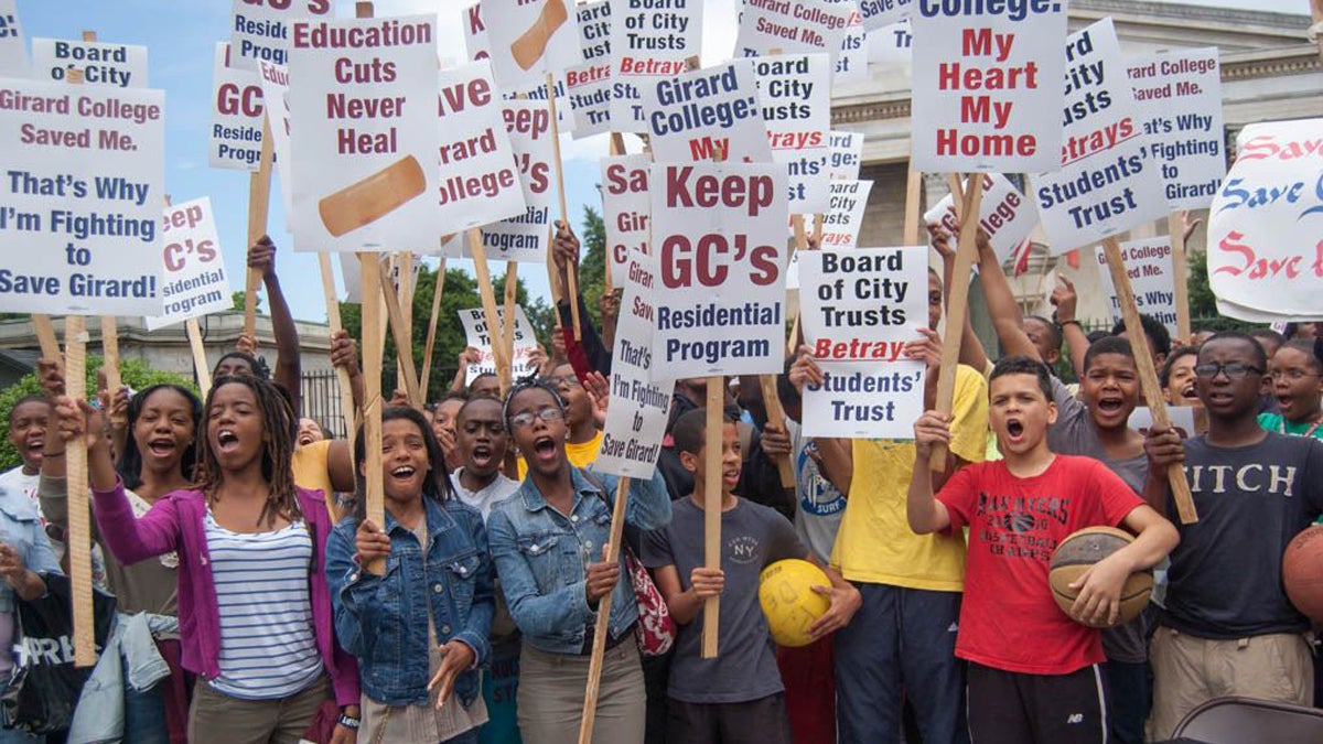  Students, alumni and parents gathered at Girard College in Philadelphia on June 14 to protest the plan to eliminate grades nine through 12 at the end of next year. (Ann  Marie Awad/for NawsWorks) 