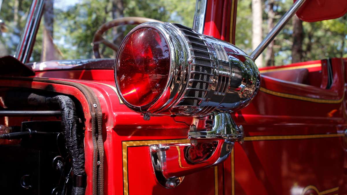 Detail of a classic fire truck at the 37th annual fire apparatus show and muster at the 37th Annual Fire Apparatus Show and Muster at WheatonArts, in Millville, NJ, on Sunday. (Jana Shea for NewsWorks)