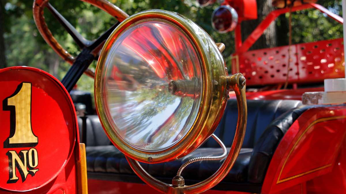 It's the brass and chrome details that really showcase the evolution of fire engines at the 37th Annual Fire Apparatus Show and Muster at WheatonArts, in Millville, NJ, on Sunday. (Jana Shea for NewsWorks)