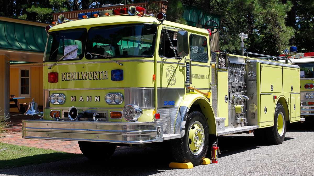 A yellow 1974 Hahn pumper at the 37th annual fire apparatus show and muster at the 37th Annual Fire Apparatus Show and Muster at WheatonArts, in Millville, NJ, on Sunday. (Jana Shea for NewsWorks)
