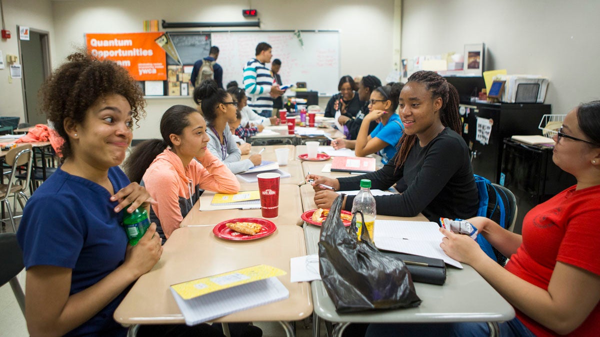  Liz Herrera-Reynoso, 14, left, and Eskarlena Conce-Molina, 14, right, both students of York Technical High School, attend an after school college prep program with kids from throughout the county in York, Pennsylvania. (Jessica Kourkounis/For Keystone Crossroads) 