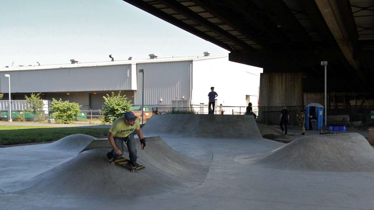 At Crescent Trail Park, skateboarders take advantage of a small park under the Grays Ferry Road. (Emma Lee/for NewsWorks)