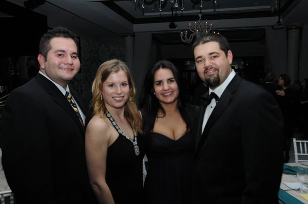 <p><p>Mr. and Mrs. Christian Hernandez (left) of presenting sponsor, State Farm, and Mr. and Mrs. Nicolas Jimenez of Comcast (Photo courtesy of George Feder)</p></p>

