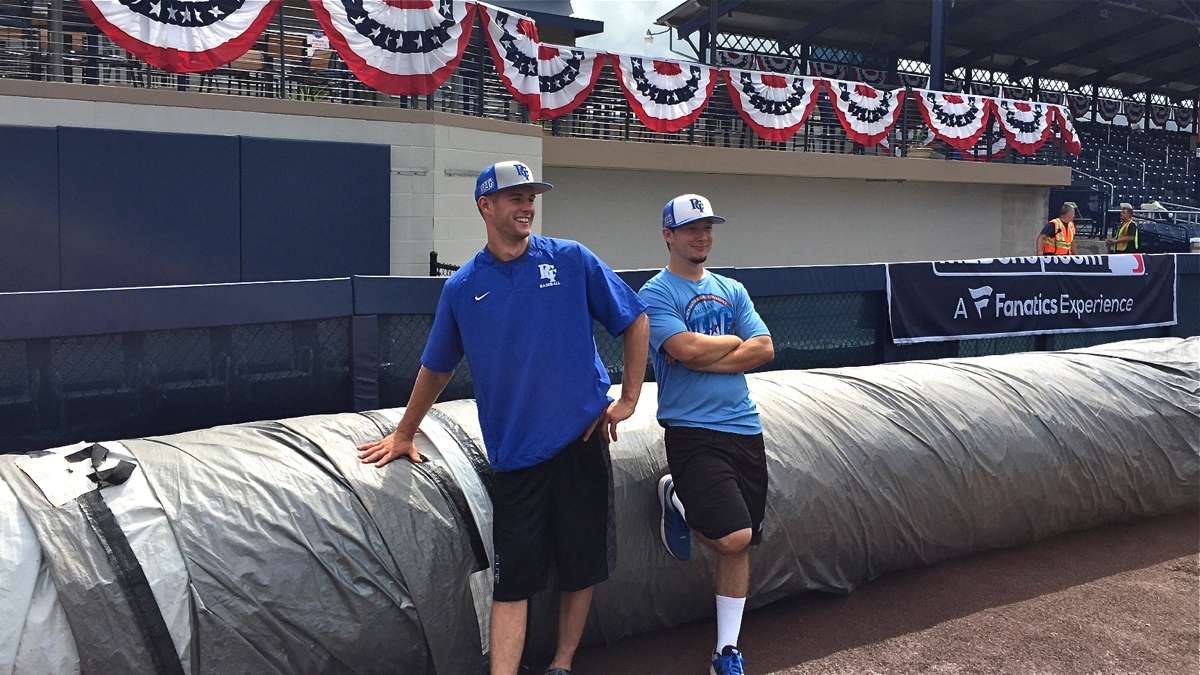 Pennsylvania College of Technology baseball players Nick Perna (left) and Cole Hofmann train at Historic Bowman Field to serve as part of the grounds crew during the inaugural MLB Little League Classic on Sunday in Williamsport, Pennsylvania. (Chris Howard)