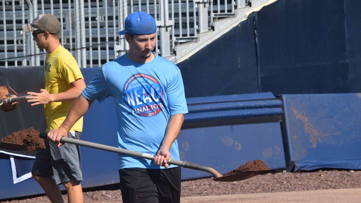 Pennsylvania College of Technology baseball players train at Historic Bowman Field to serve as part of the grounds crew during the inaugural MLB Little League Classic on Sunday in Williamsport, Pennsylvania. (Matt Blymier)