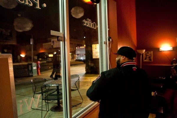 <p><p>Top Flight threw vocal jabs at people walking by as well as those in attendance at Wired Beans. (Brad Larrison/for NewsWorks)</p></p>
