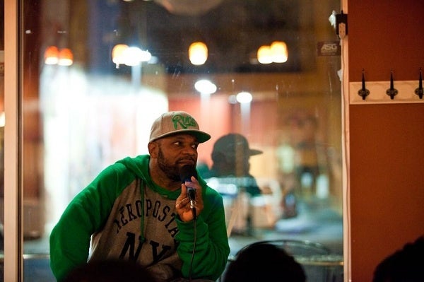 <p><p>Host and comedian Craig McLaren starts the show at the Wired Beans Cafe on Chelten Avenue in Germantown. He hopes to promote hidden talent in Philly through the weekly event. (Brad Larrison/for NewsWorks)</p></p>
