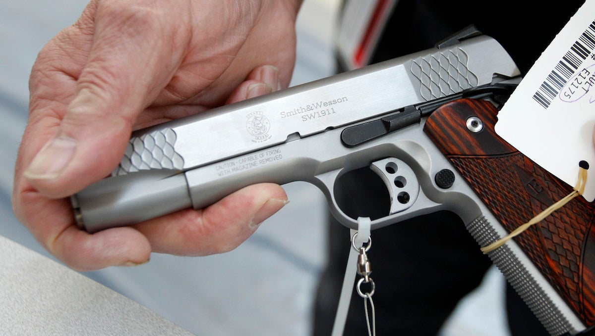  A .45 cal pistol at the display set up before the National Rifle Association's annual meeting in Pittsburgh, in 2011. (AP Photo) 