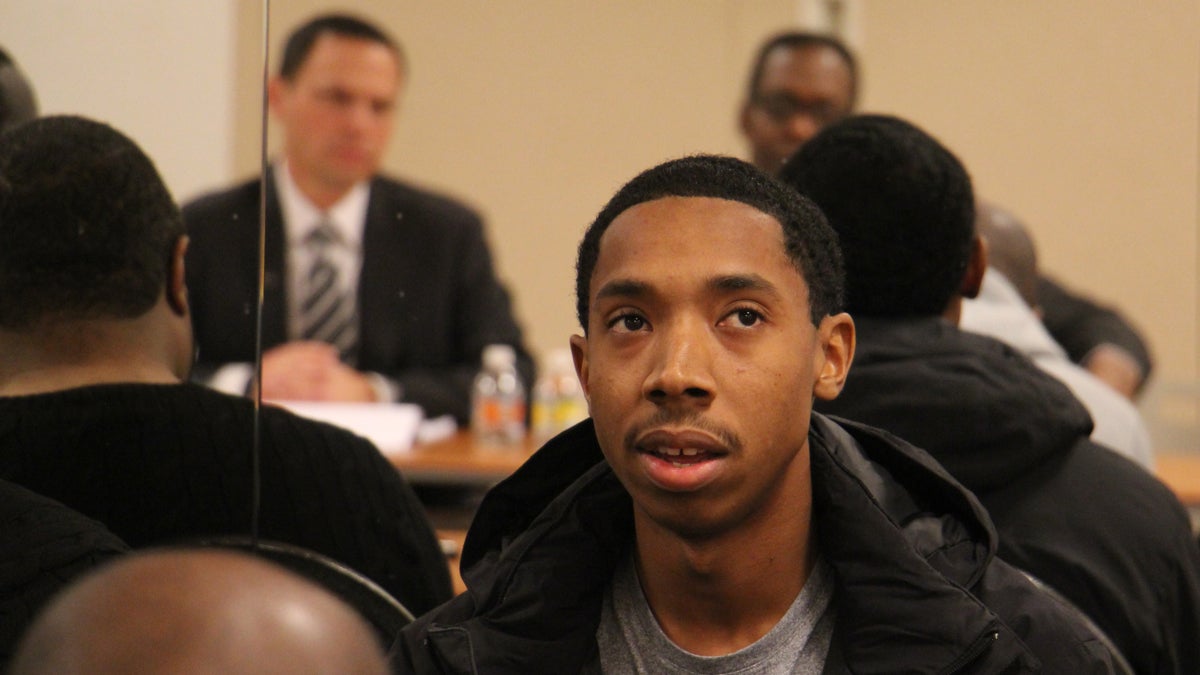  John Solomon, 24, talks about his experiences with guns, which began when he was 11 years old and ended with a 5-year prison sentence. He spoke during a community meeting in North Philadelphia with Pennsylvania Attorney General-elect Josh Shapiro. (Emma Lee/WHYY) 