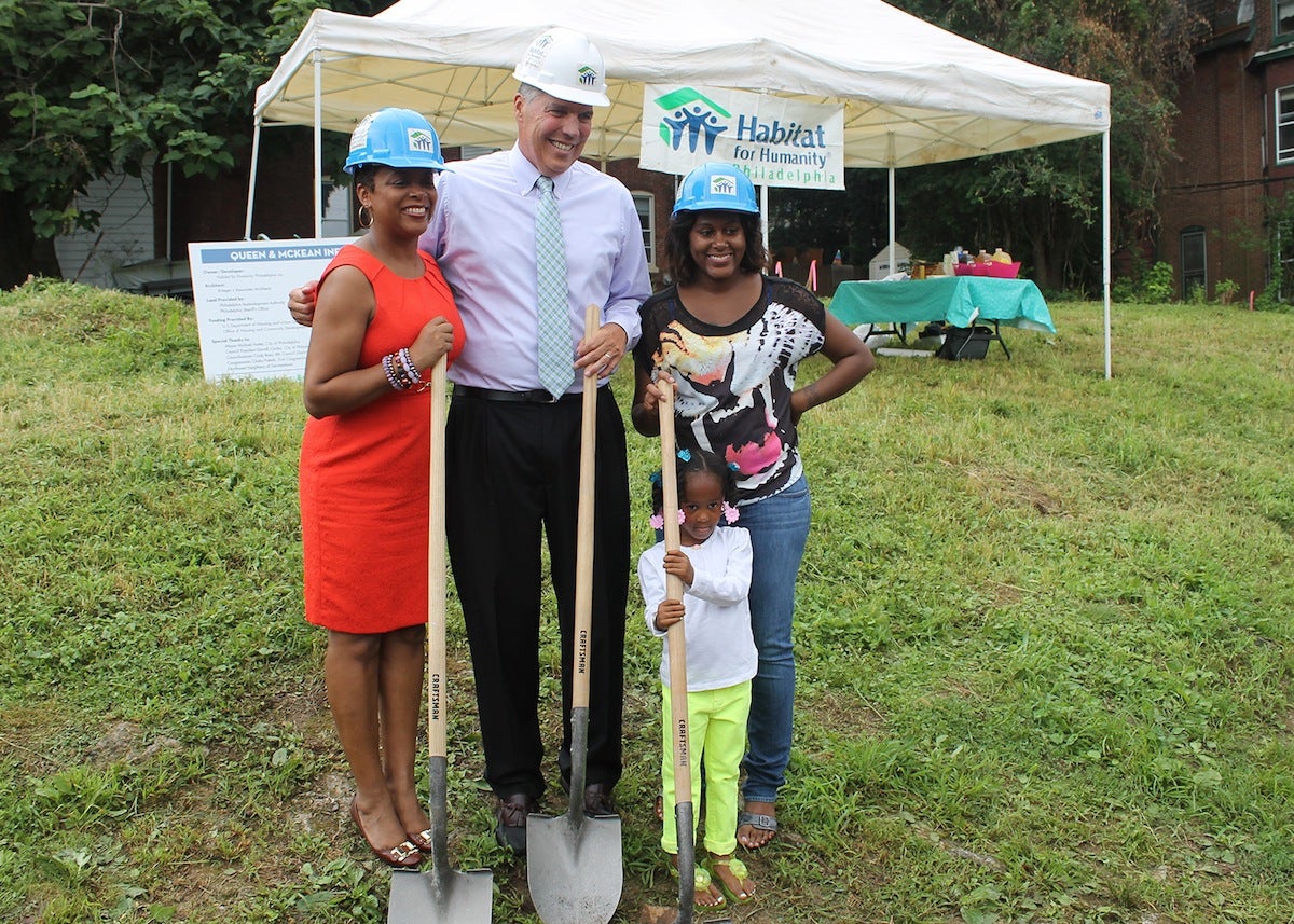  Councilwoman Cindy Bass and Frank Monaghan of Habitat for Humanity breaking ground with future homeowner Quaseemah Carr and her daughter, Jornee. (Matthew Grady/for NewsWorks) 