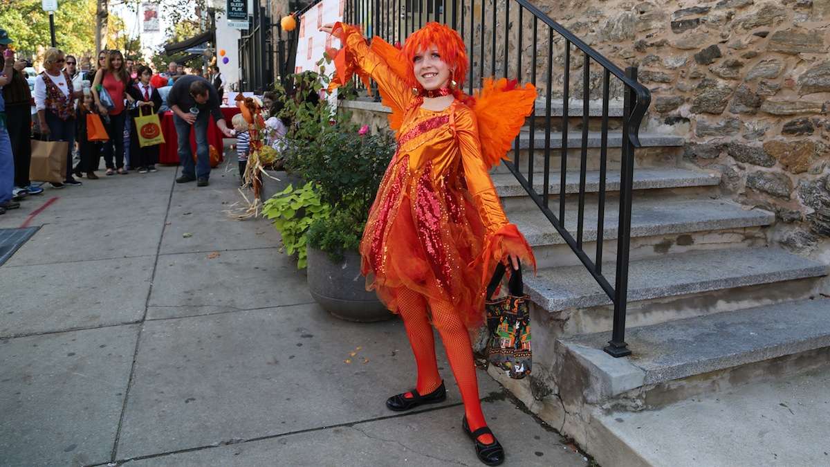 Fairy Regan Riley says her favorite part of Halloween in Manayunk is getting candy. (Natavan Werbock/for NewsWorks)