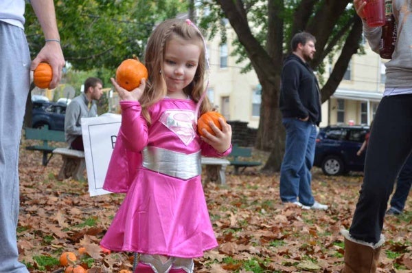 <p><p>A miniature Superwoman participates in the pumpkin toss at Pretzel Park. (Zach Shevich/for NewsWorks)</p></p>
