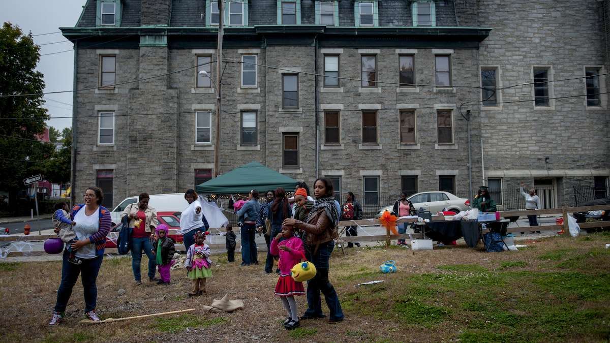 Crowds gather for games during the West Rockland Street Halloween Party at the intersection with Greene Street in southern Germantown on Halloween evening. (Tracie Van Auken/for NewsWorks)