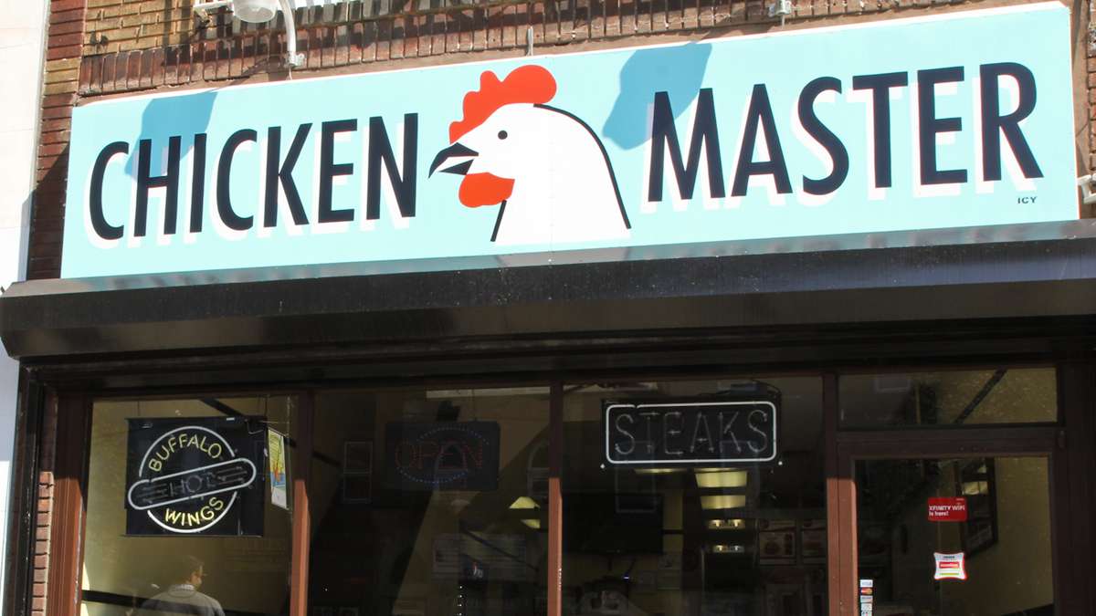 An Icy Sign at Chicken Master on Girard Avenue in Brewerytown. (Kimberly Paynter/WHYY)