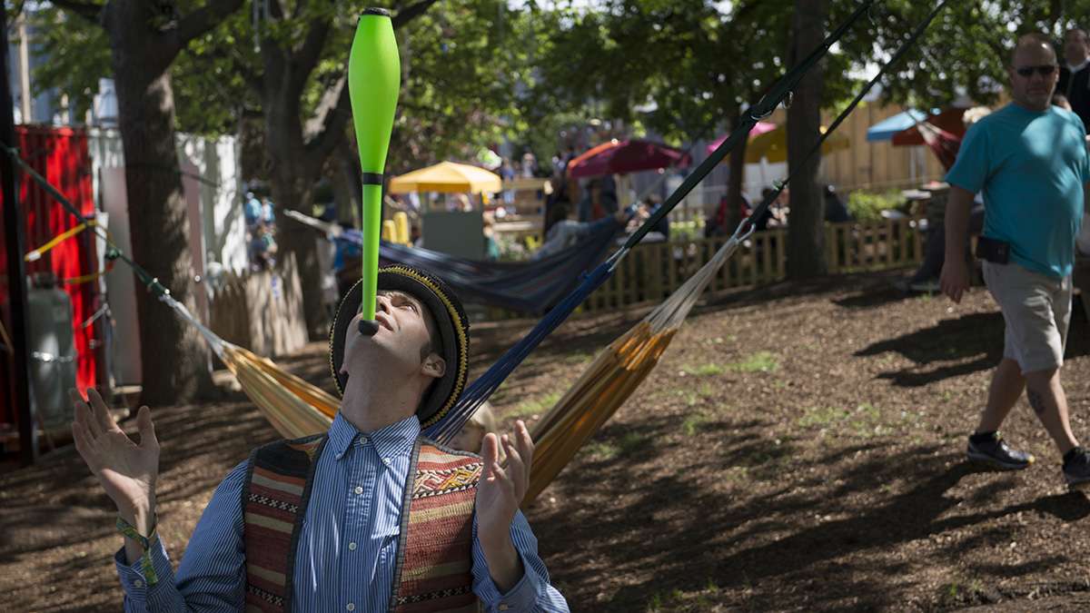 Professional juggler David Ramsay IV shows off his talents during the opening weekend of the Spruce Street Harbor Park.