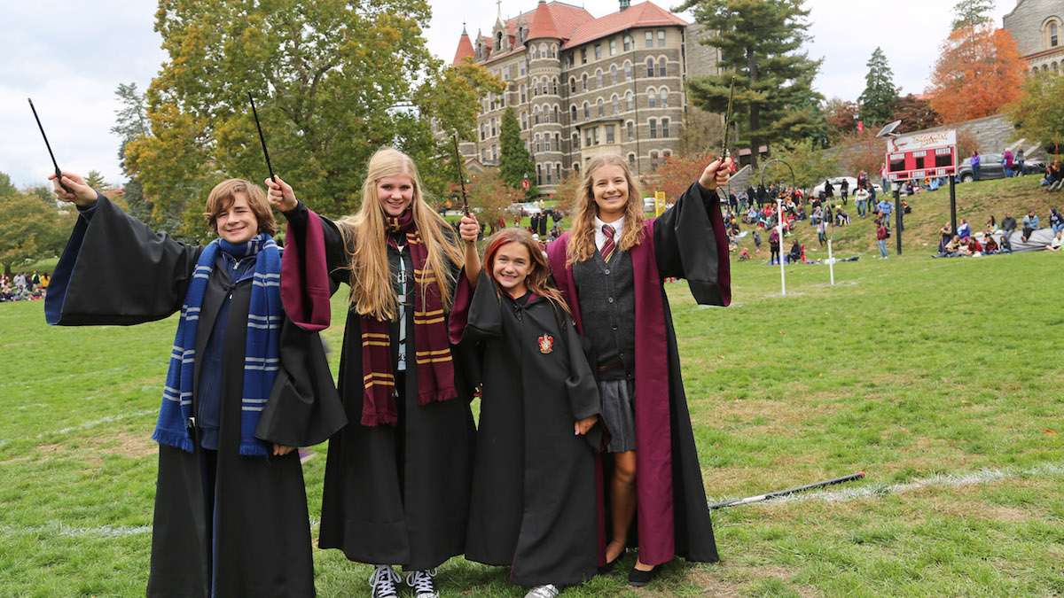 (L-R) Cameron, Anna, Amy and Ericka dressed in their Harry Potter best at the Chestnut Hill College campus (Natavan Werbock/for NewsWorks)