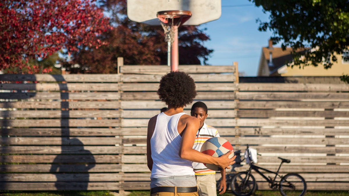  Kids play basketball at a neighborhood park in Hazleton, Pennsylvania. (Jessica Kourkounis/For Keystone Crossroads) 