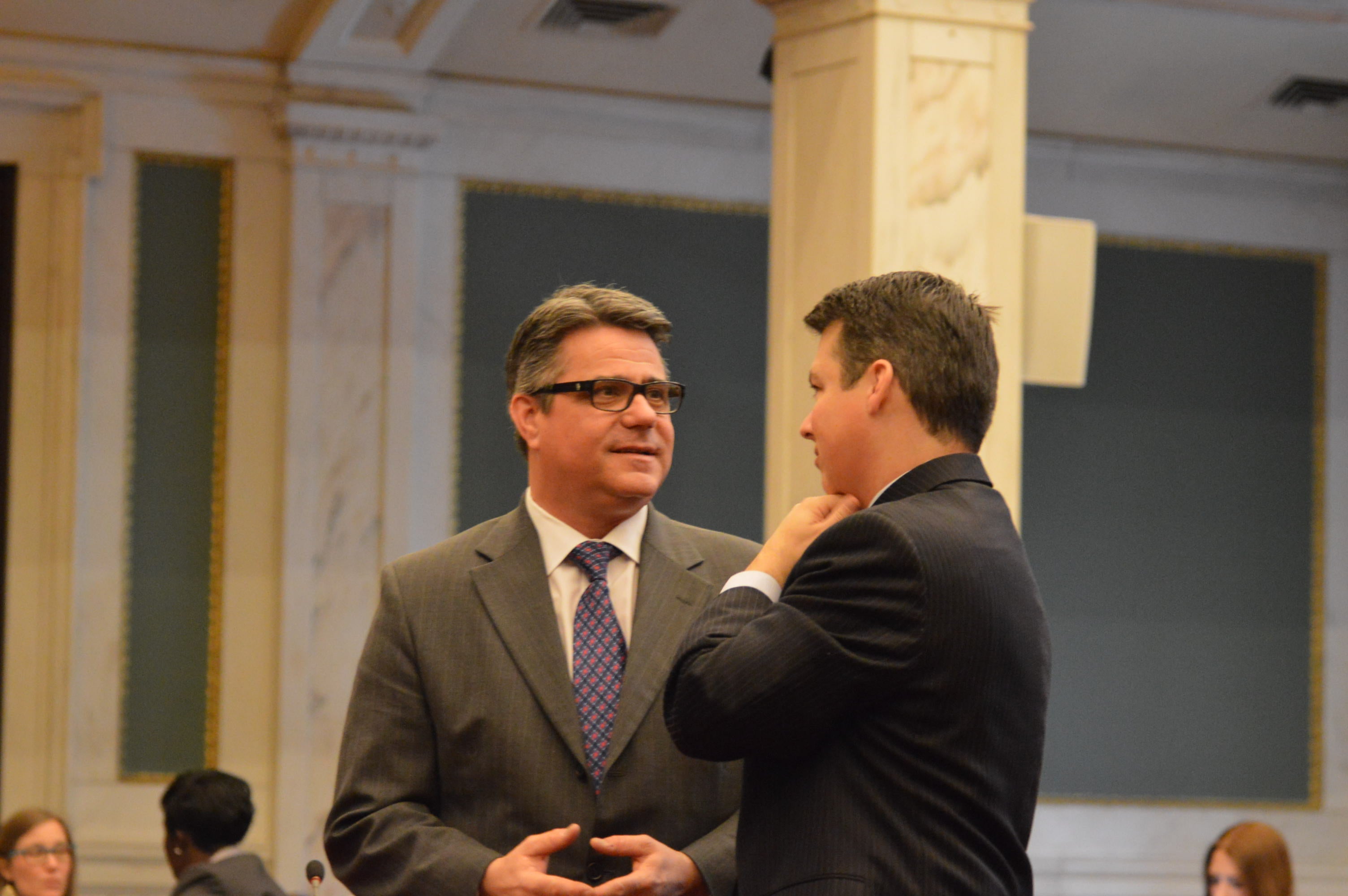  Councilman Bobby Henon speaks with U.S. Rep. Brendan Boyle prior to the hearing. (Tom MacDonald/WHYY) 