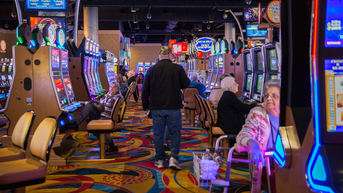  Players try their luck on the slot machines at the Hollywood Casino at Penn National Race Course in Dauphin County, Pennsylvania.  (Lindsay Lazarski/WHYY)  