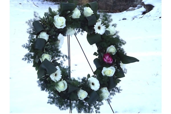 <p><p>A wreath was placed to honor Hannah Atkinson and the unknown slaves who are also buried in the graveyard. (J. Woods/NewsWorks)</p></p>
