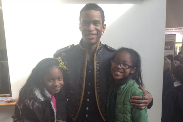 <p><p>Imani charter school students Veronique Wilson and London Murray meet Peter "Prince Sebastian" Townsend. (Courtesy of Imani/Arden)</p></p>
