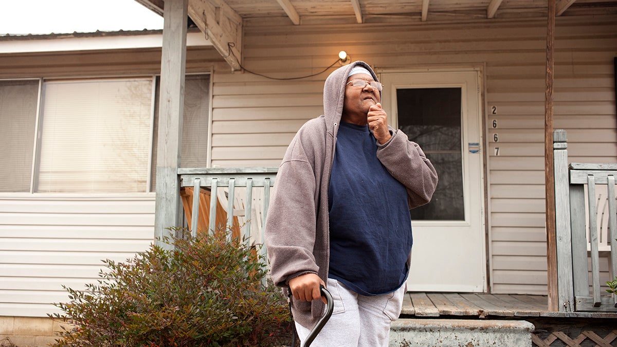  Annie Keller in front of her house in Ashurst Bar/Smith, Alabama. Keller said she's scared of what the landfill is doing to the environment and she no longer sits on her porch because of the smell from the dump. (Irina Zhorov) 