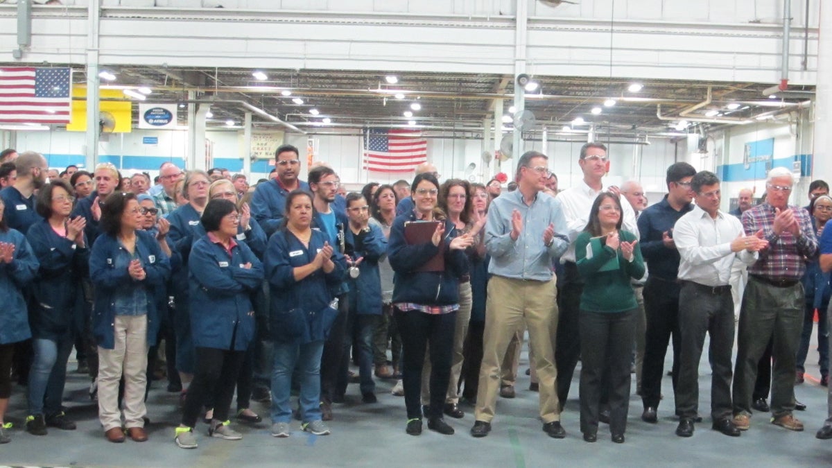  Workers at Zodiac Aero Evacuation Systems celebrate  10 years of New Jersey’s Basic Skills Workforce Training Program at the company in Wall. (Phil Gregory/WHYY) 
