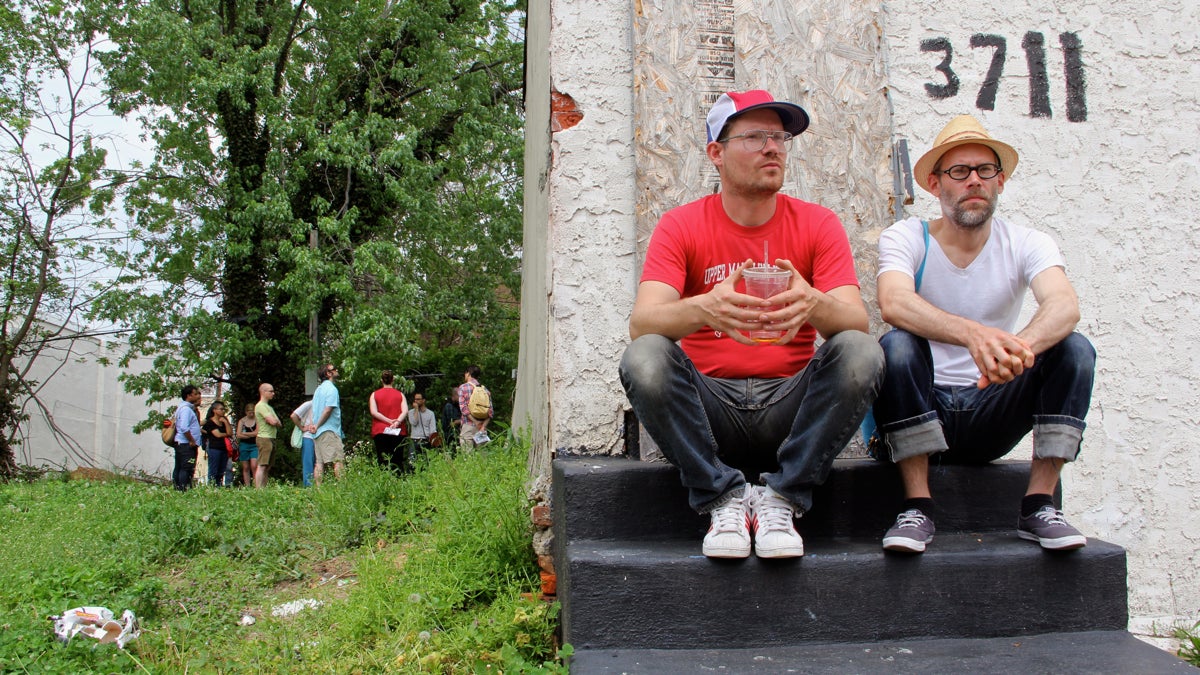  Brothers Billy (left) and Steven Dufala are planning a funeral for the home at 3711 Melon St. in Mantua, a community art project organized by Temple University's Tyler School of Art. (Emma Lee/WHYY) 