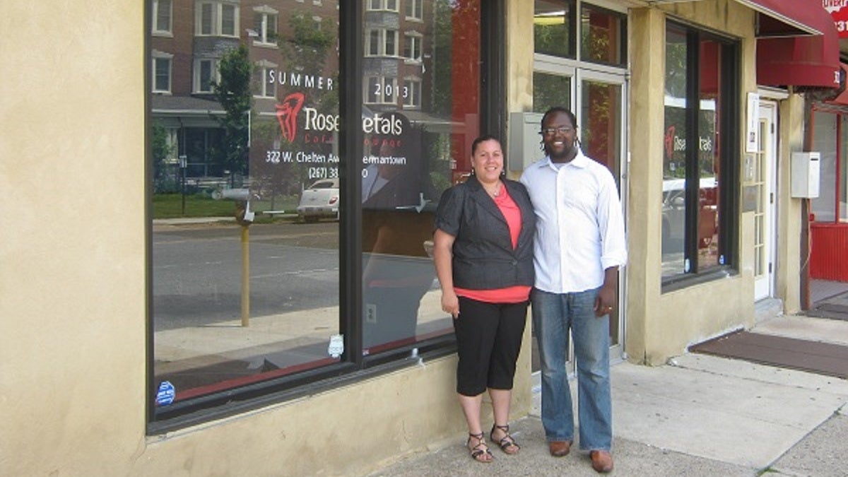  Desmin and Jania Daniels stand outside what will soon be their restaurant on West Chelten Avenue in Germantown. (Alaina Mabaso/for NewsWorks) 