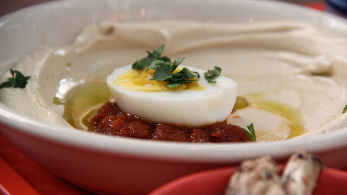  Hummus with Matbucha is one of four varieties served at Dizen Goff. (Emma Lee/WHYY) 