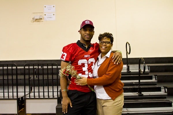 <p><p>David Williams and his mother Tamara Bunch were all smiles after Williams officially signed with the University of South Carolina on Wednesday. (Brad Larrison/for NewsWorks)</p></p>
