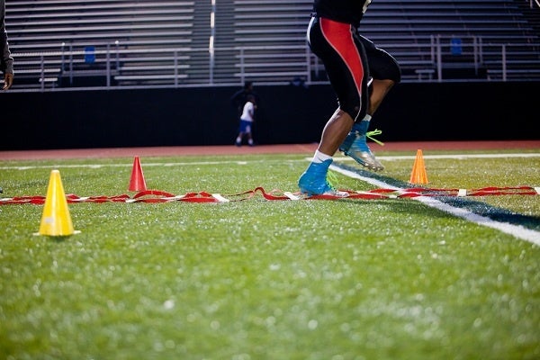 <p><p>Running drills at the start of practice. (Brad Larrison/for NewsWorks)</p></p>
