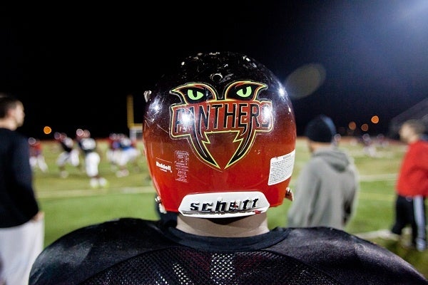 A game-battered Panthers helmet.