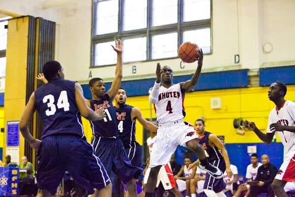 Abraham Massaley of Imhotep Charter with the layup. (Brad Larrison/for NewsWorks)
