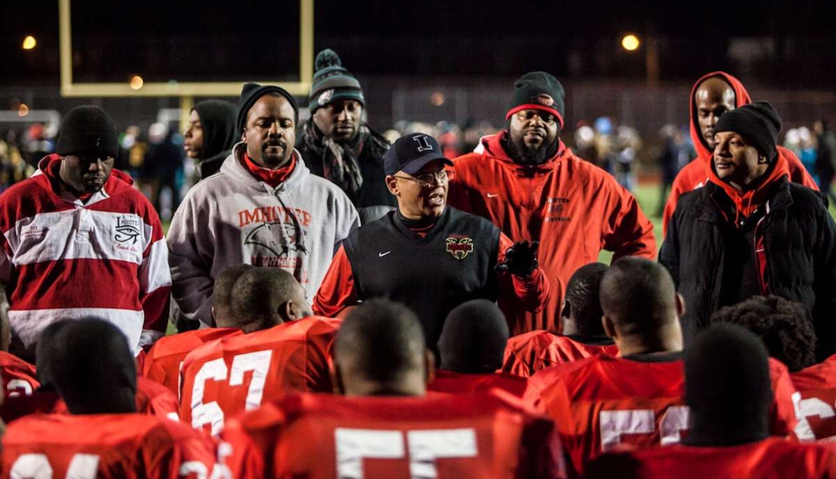 Imhotep Head Coach Albie Crosby speaks about his love for a team that fought back and fell just short in the AAA championship game. (Brad Larrison/for NewsWorks)