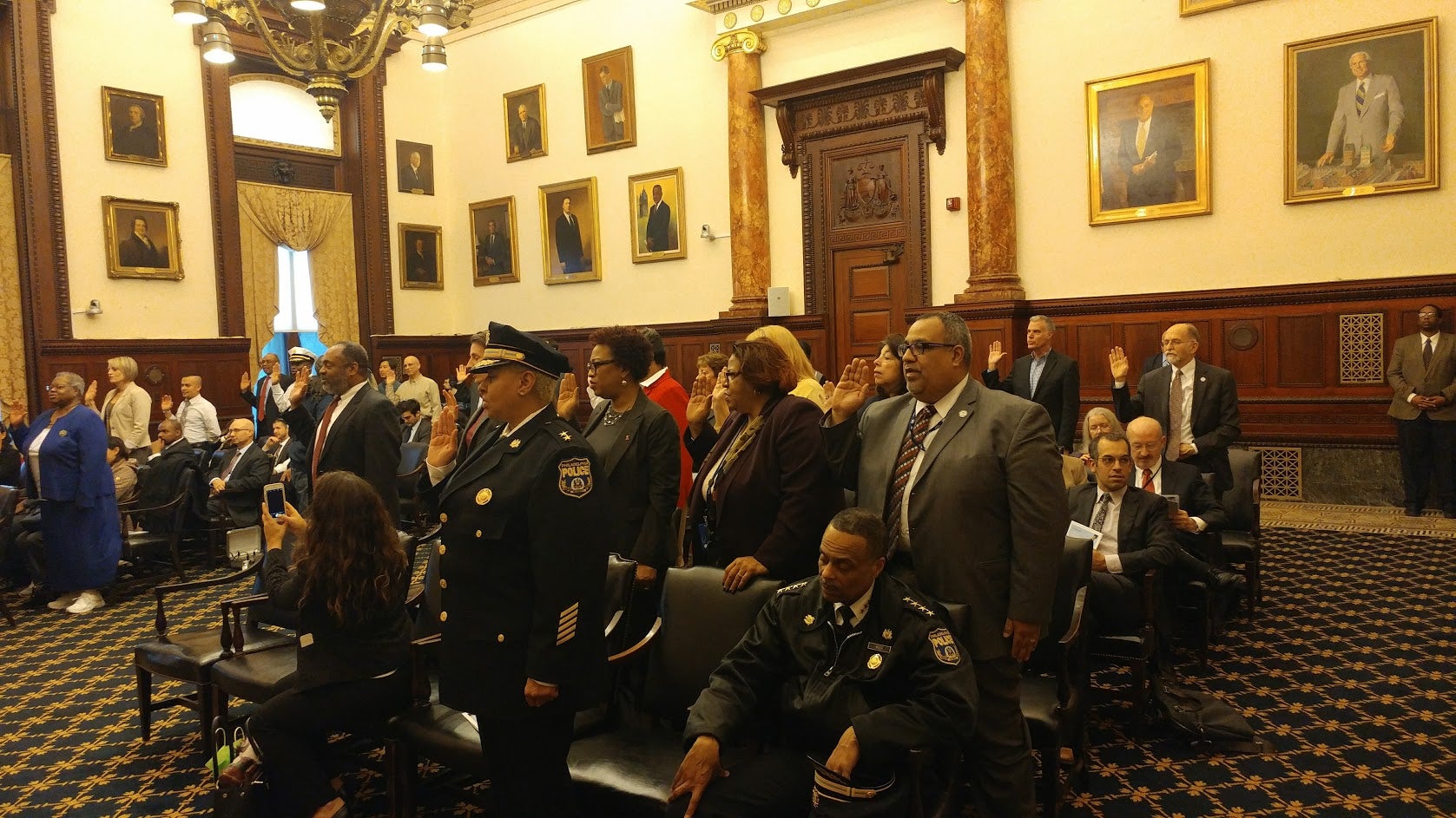 A new crop of Philadelphia integrity officers taking the oath of office Wednesday. (Tom MacDonald/WHYY) 