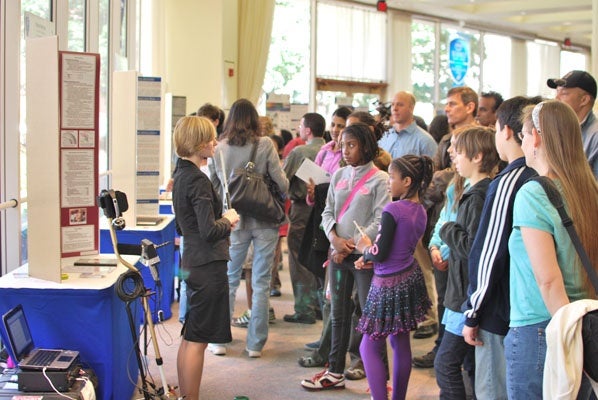 <p><p class="p1">Marian Bechtel, Seaborg Award winner of the 2012 Intel Science Talent Search speaking to attendees of Public Day about her project. (Courtesy of Society for Science & the Public)</p></p>
