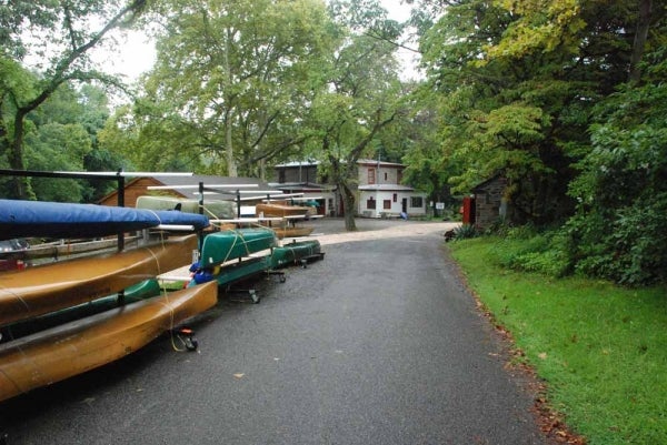 The entire driveway is expected to flood. Building caretaker, Kris Alutius, jokingly calls the Philadelphia Canoe Club 