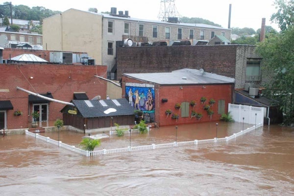 The back deck of Manayunk Brewery is completely underwater (Max Matza/for NewsWorks)