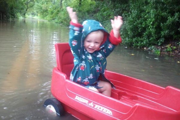 Hudson Howie enjoys a ride in his wagon on what is supposed to be River Road in Gladwyne. (Photo courtesy of Pete Howie)