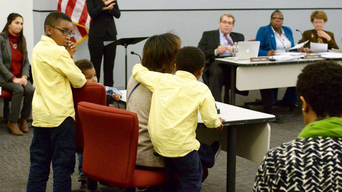 Over 60 parents, students, teachers and community members testified before the SRC Thursday. Early in the meeting, Novilette Jones and her children thanked Hite for pushing to keep Wister under district control. (Bastiaan Slabbers for NewsWorks)
