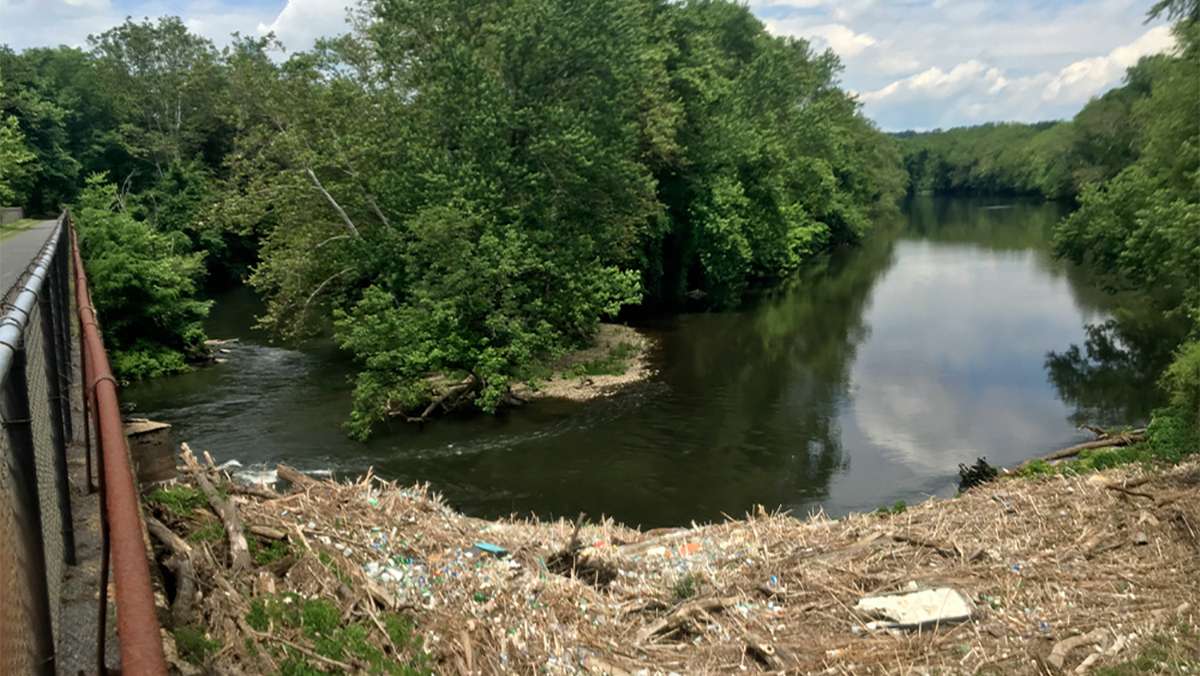Trash backs up in the Schuylkill River at the SRT bridge near Douglassville. (Schuylkill Action Network)